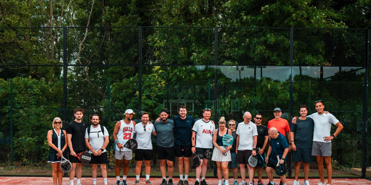 Group of padel players on court at a Padel X Americano social event