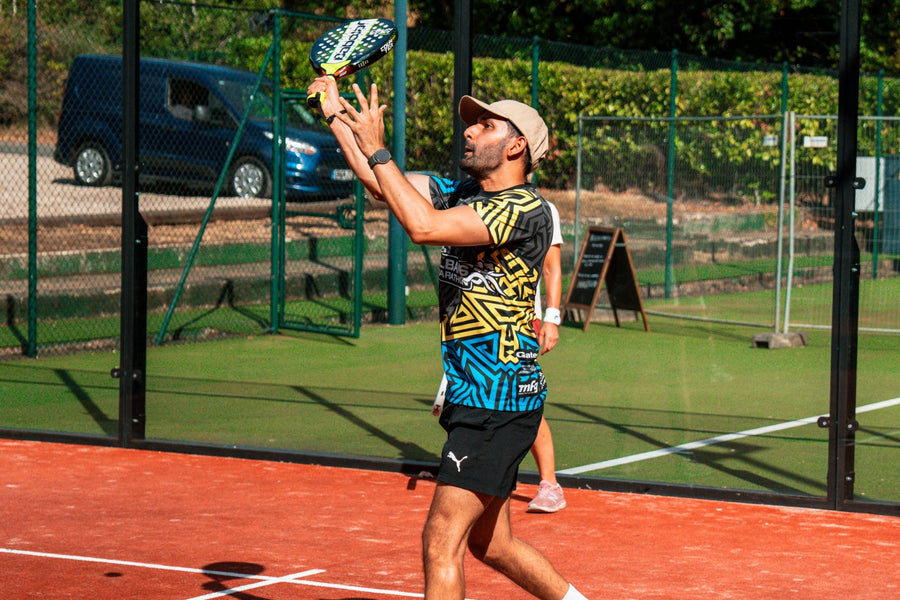 Padel player preparing to hit an overhead during a Mexicano at Padel X
