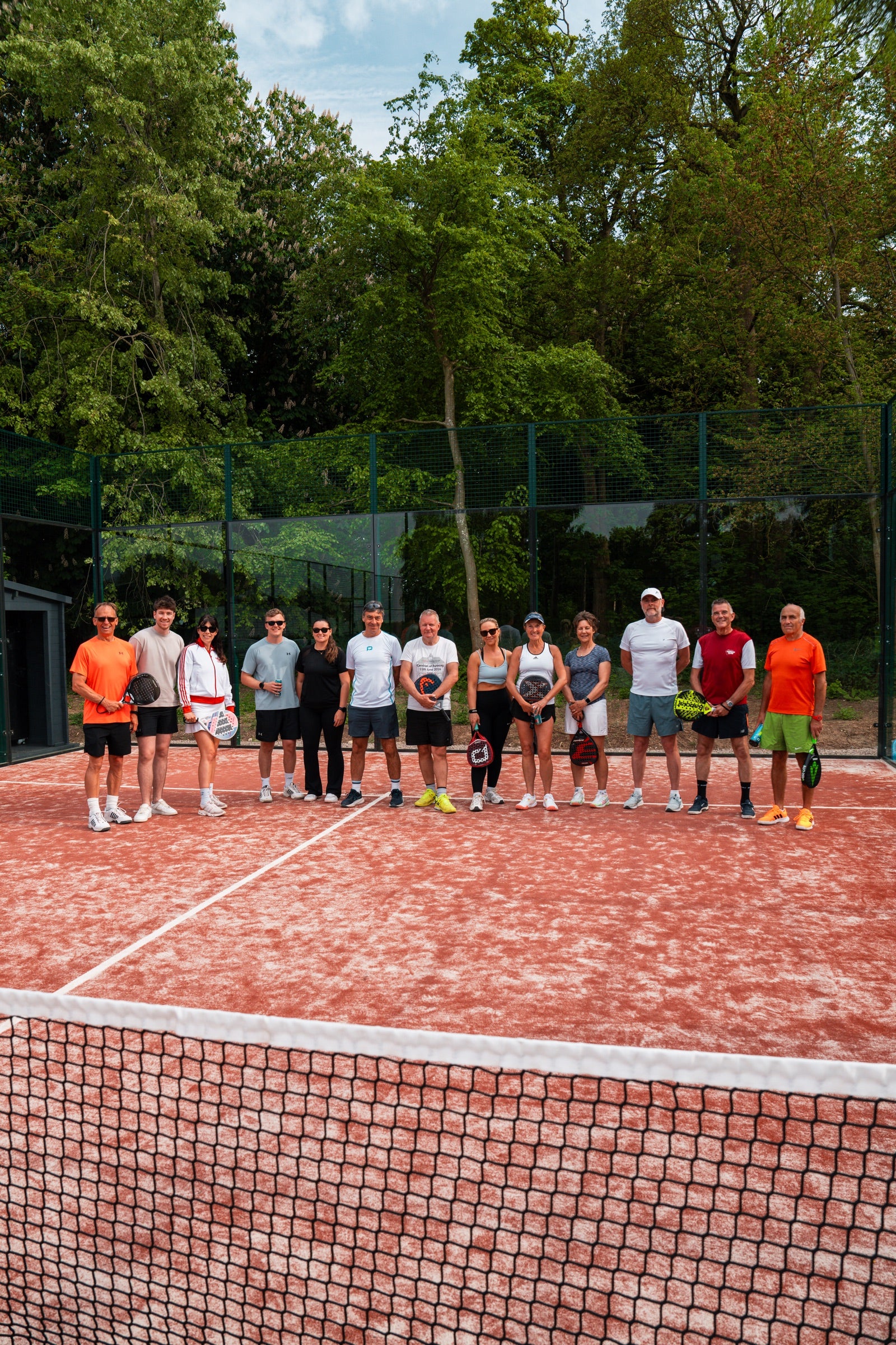 Padel X community gathered on court at the Burghley Park Open Day