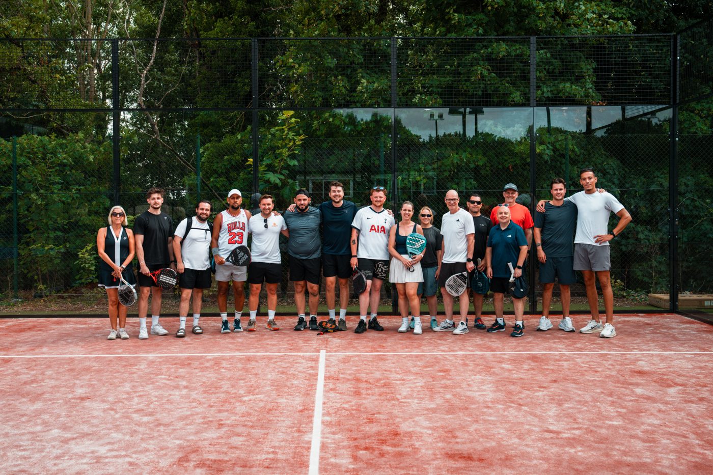 Players lined up on court at the PadelX The Ponsbourne Club launch event