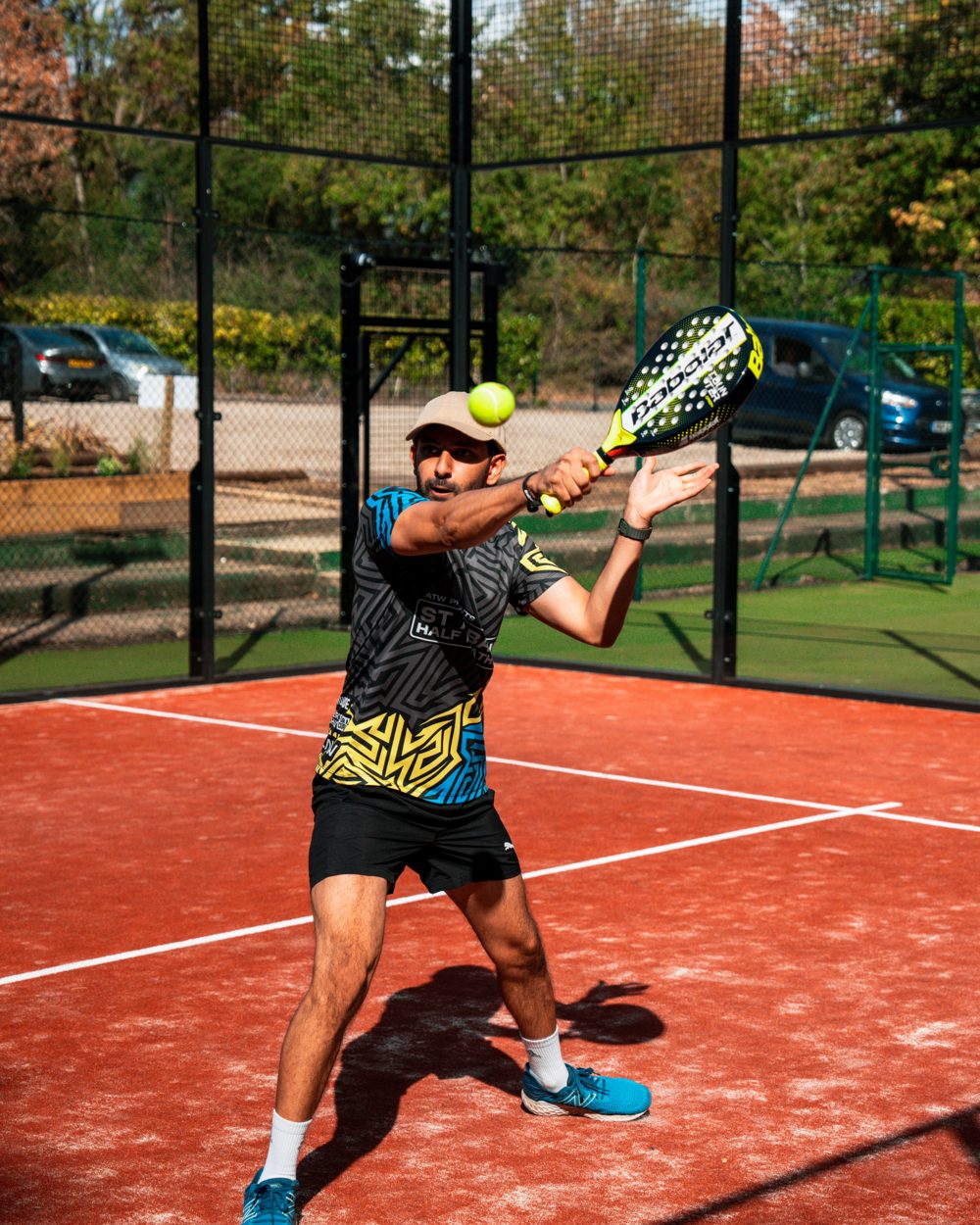 Player hitting an overhead smash on a Ponsbourne padel court
