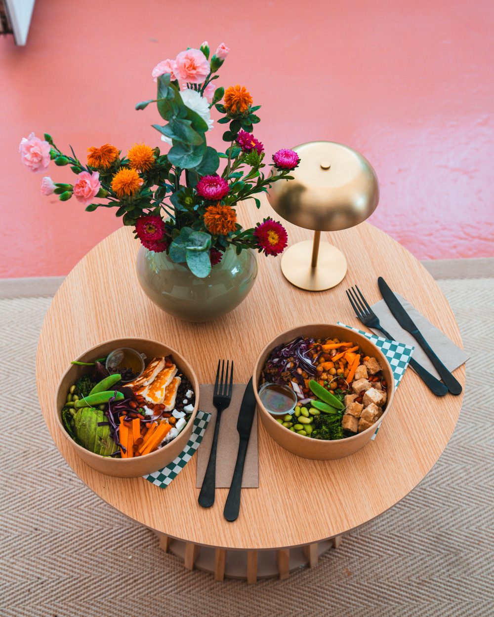 Two fresh food bowls on a table at Yetz Café